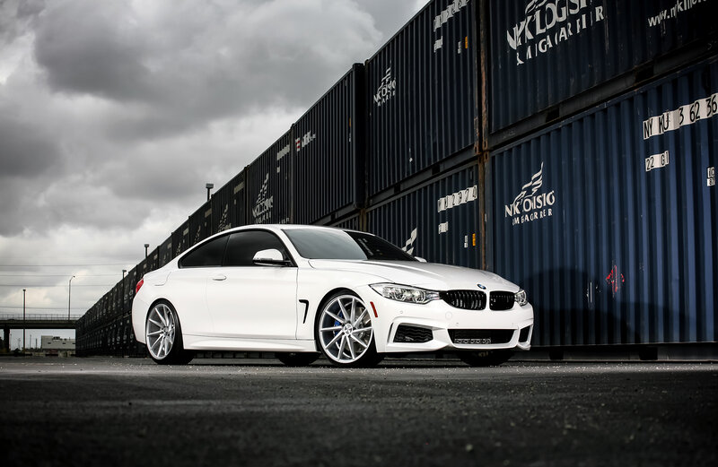 White Bmw Coupe — Dramatic, Photograph, Shipping Containers