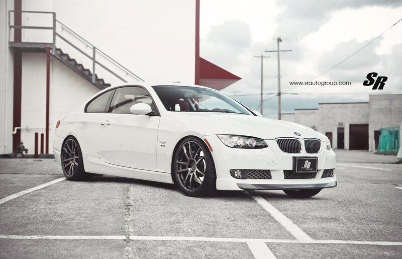 white bmw coupe in parking lot