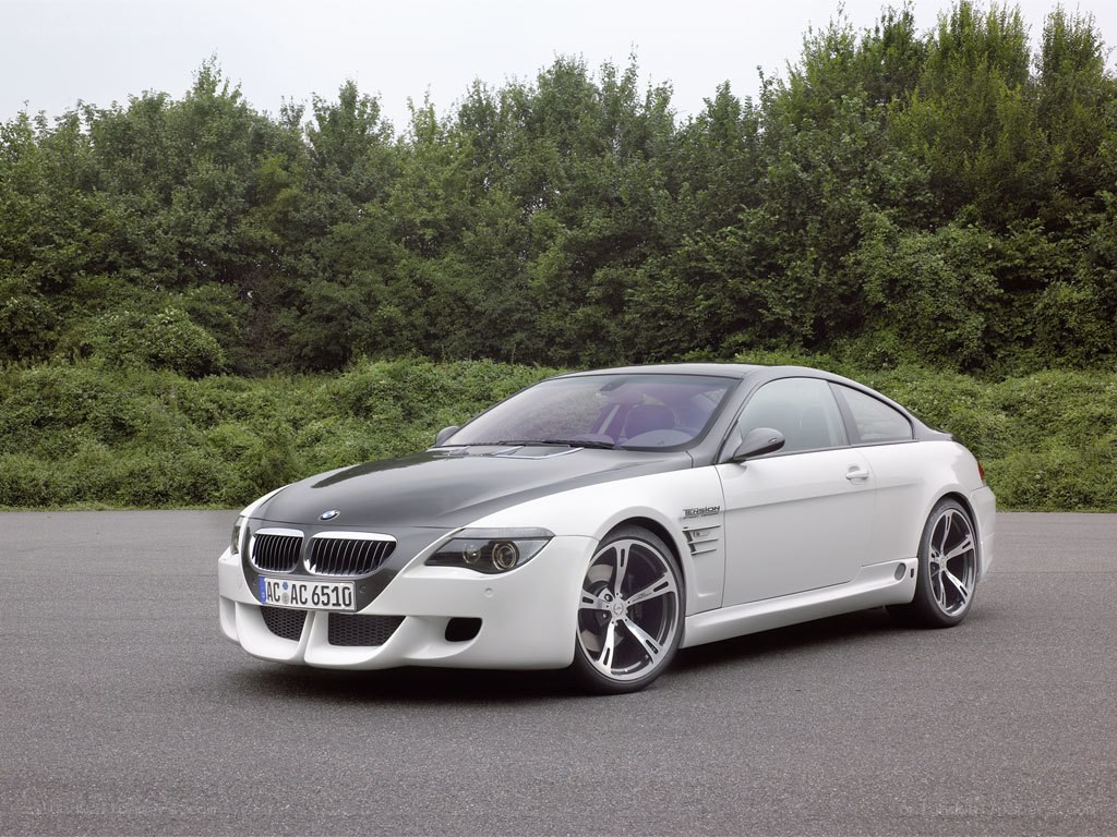 white bmw coupe on asphalt