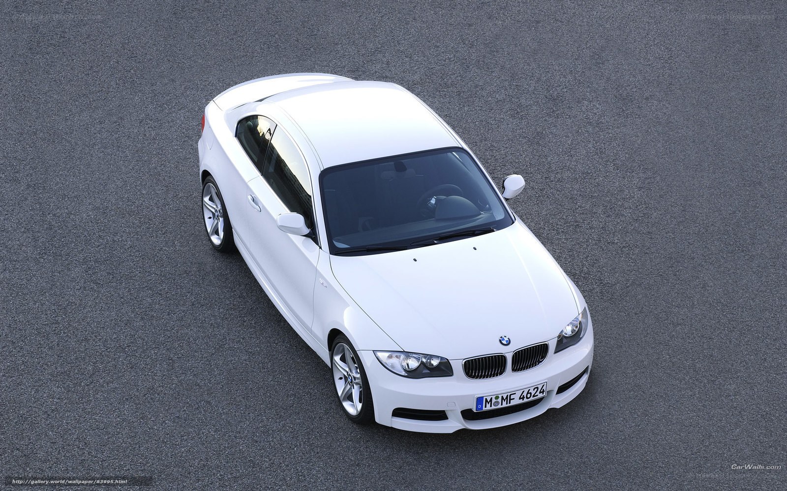 white bmw coupe on asphalt