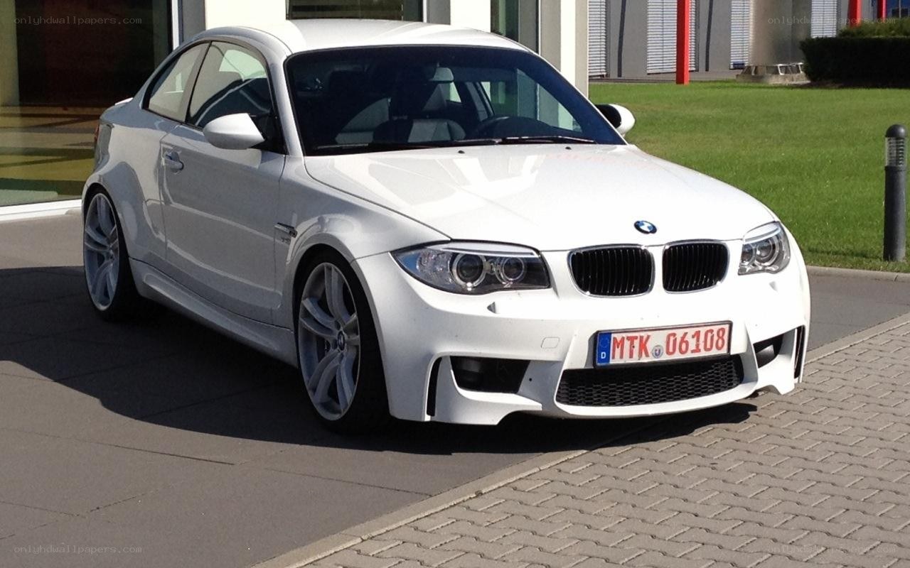 white bmw coupe parked outside