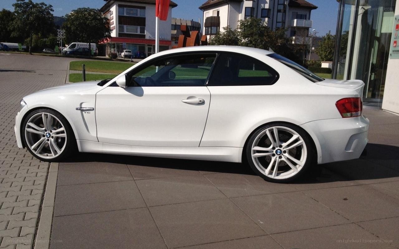 white bmw coupe parked outside