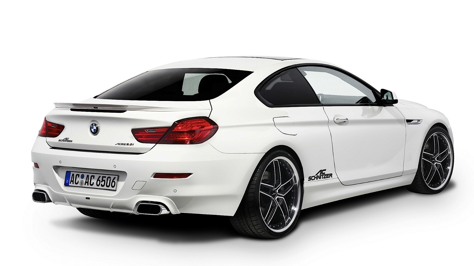 white bmw coupe with ac schaftz