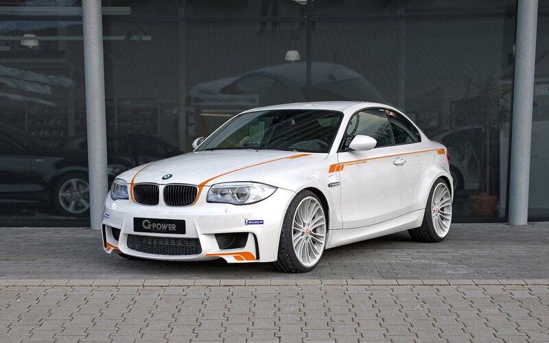 white bmw coupe with orange stripes