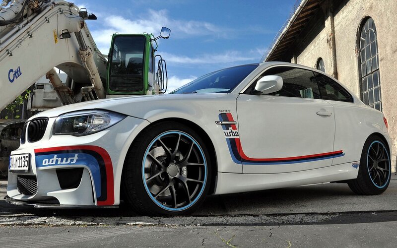 white bmw coupe with racing decals