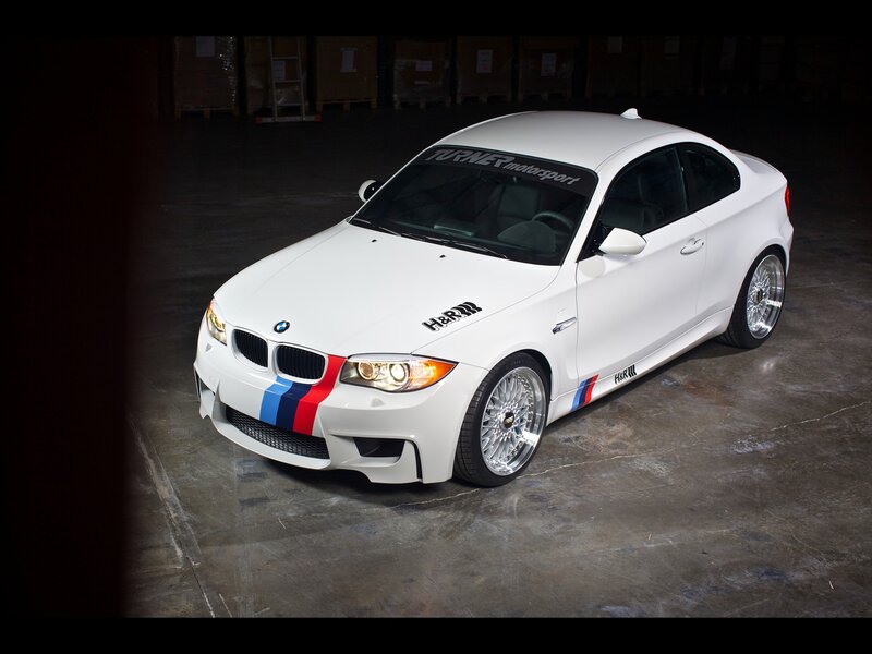 white bmw coupe with racing stripes