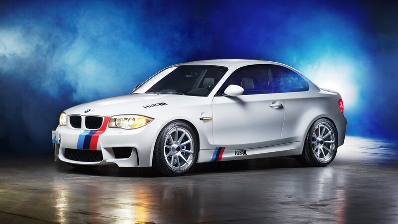 white bmw coupe with racing stripes