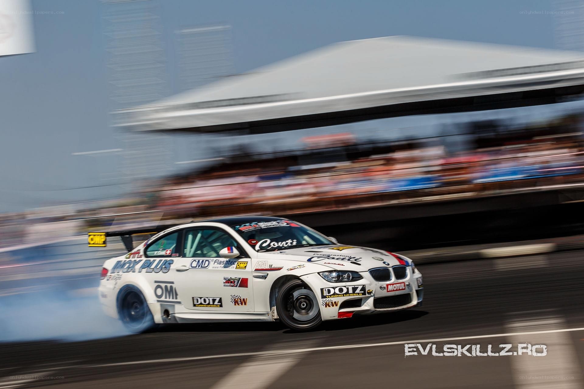 White BMW drifting on track