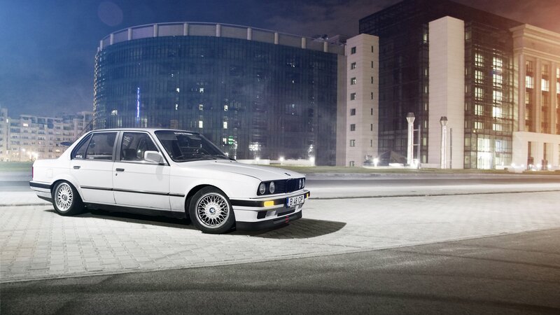 white bmw e30 at night