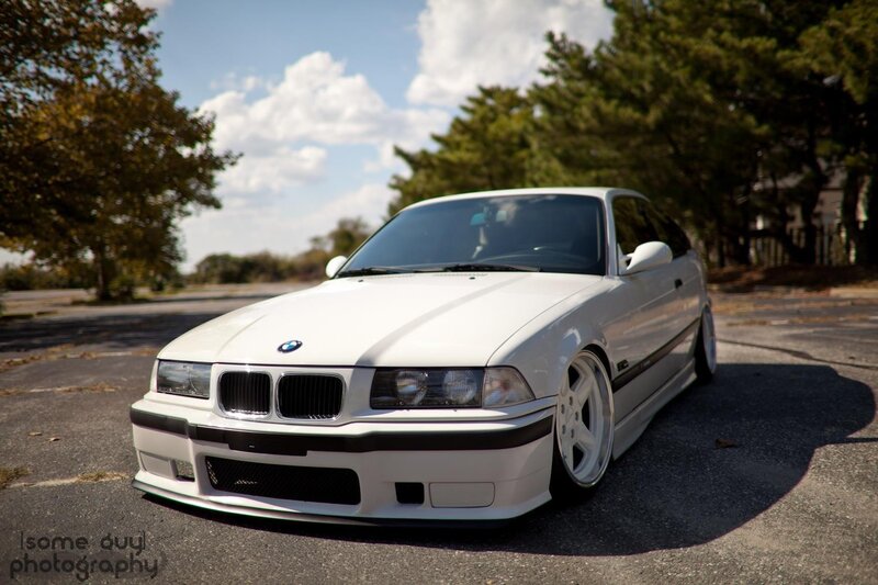 white bmw e36 on asphalt