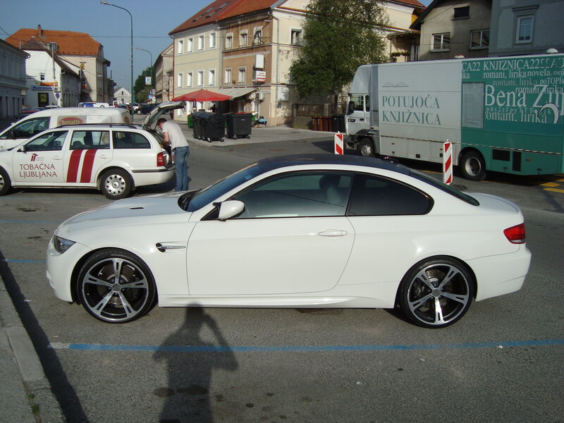 White BMW in a city street