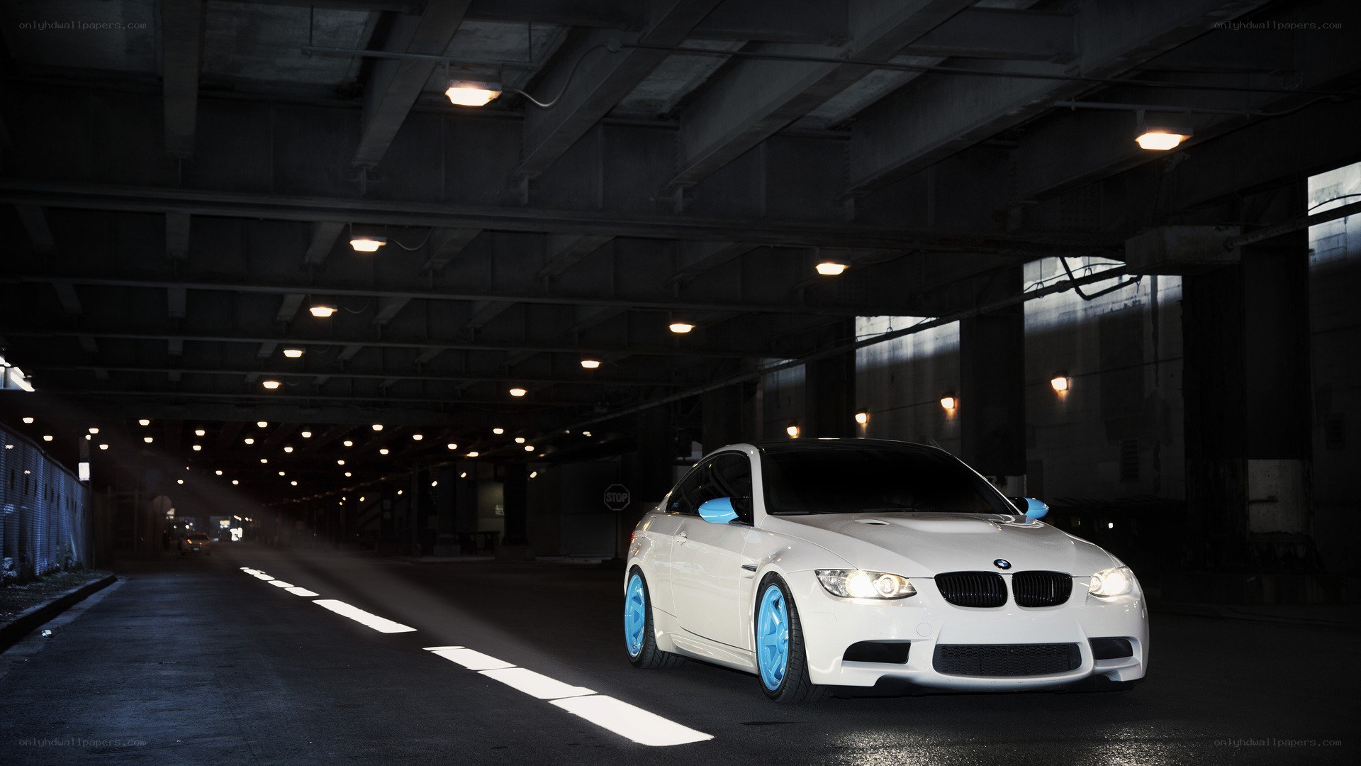 White BMW in a tunnel