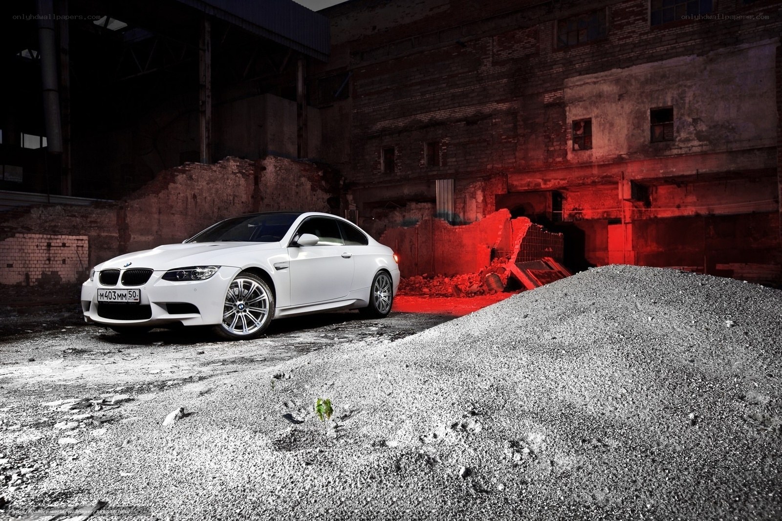 White BMW in an abandoned warehouse
