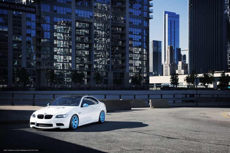 White BMW in city parking
