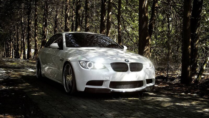 White BMW in forest