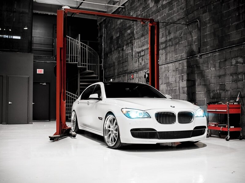 White BMW in garage