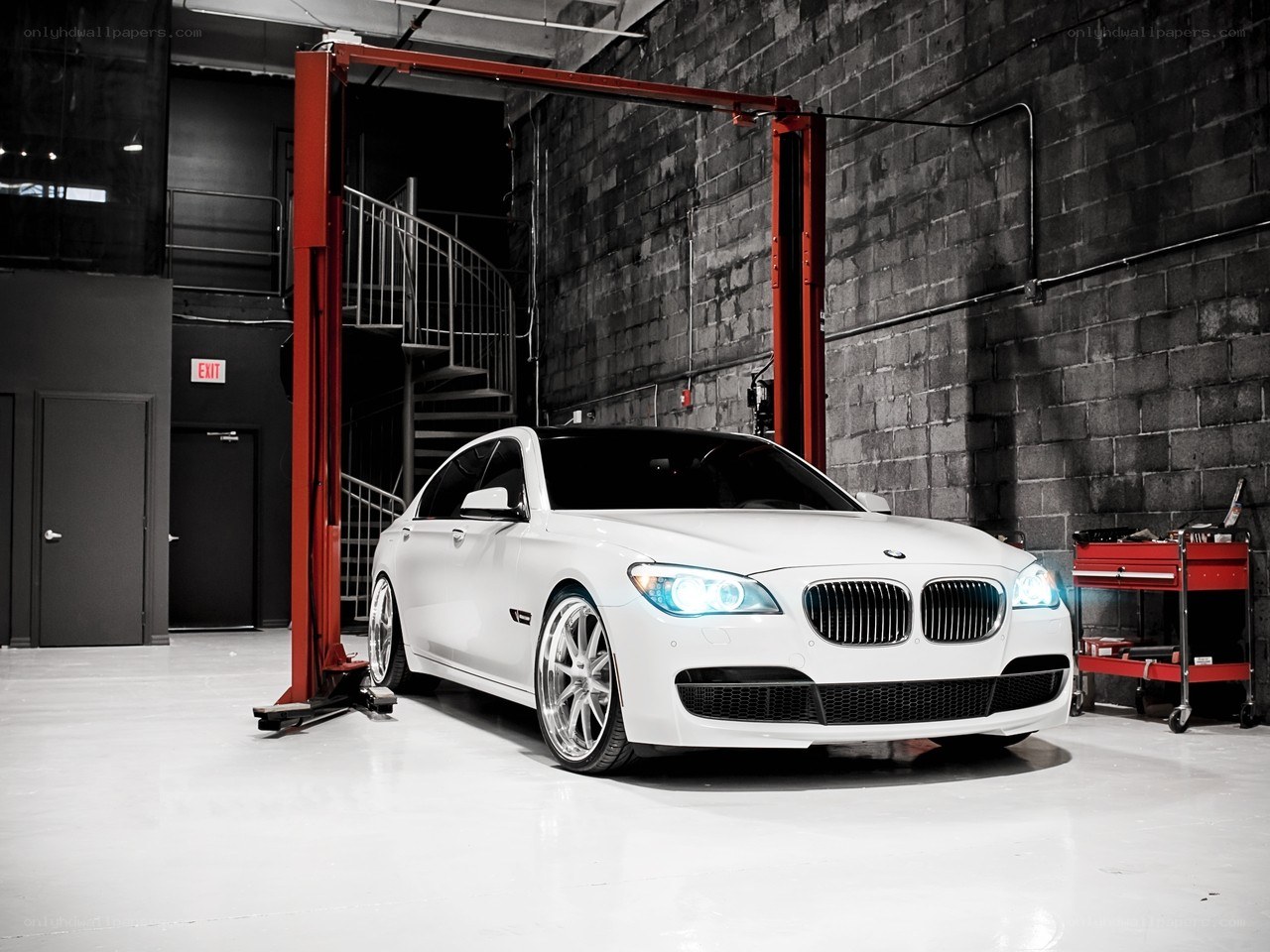 White BMW in garage