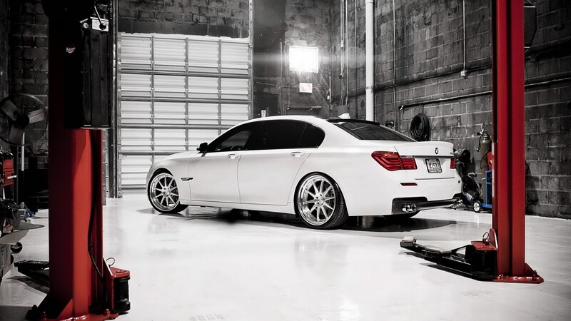 White BMW in garage