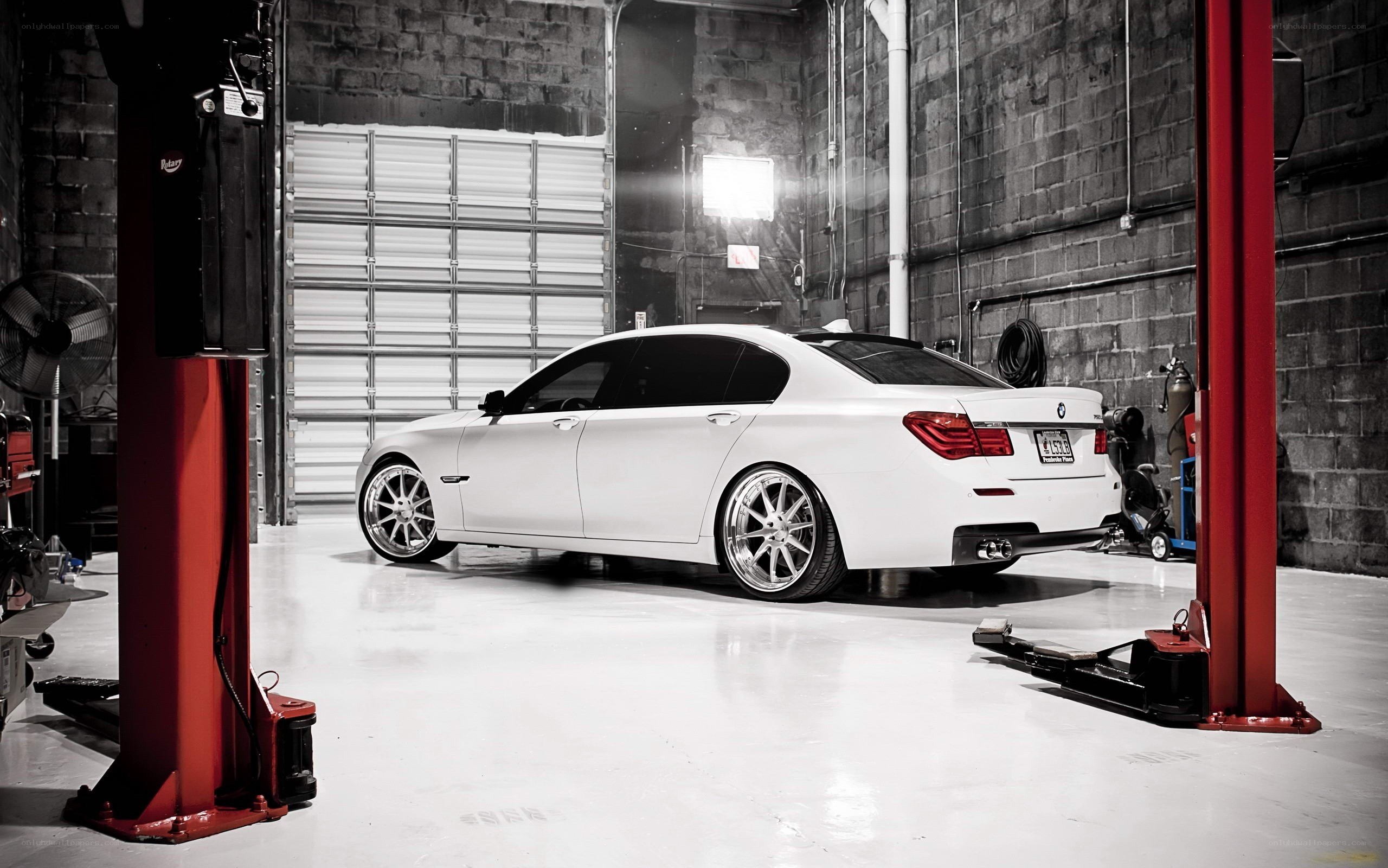 White BMW in garage