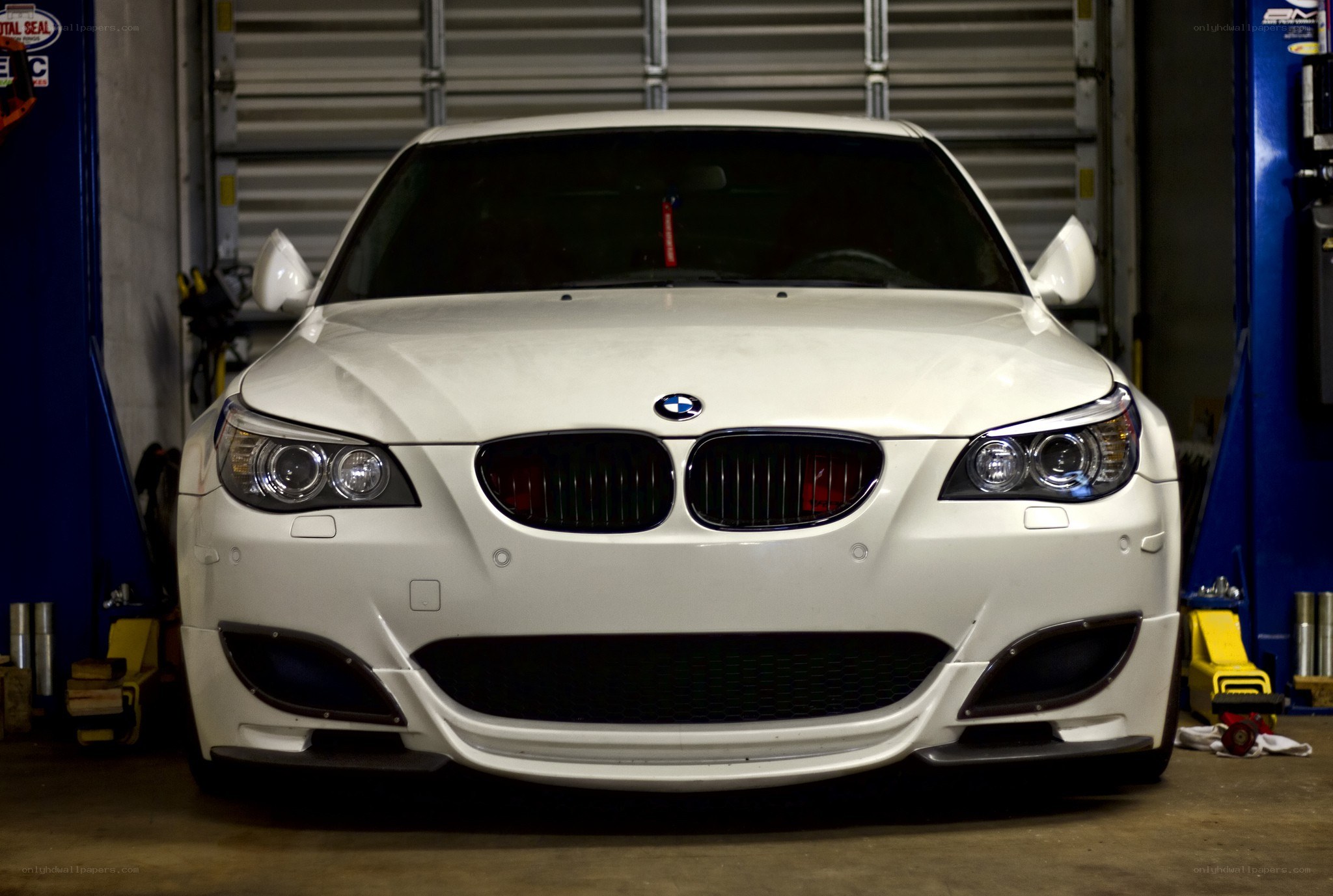 white bmw in garage