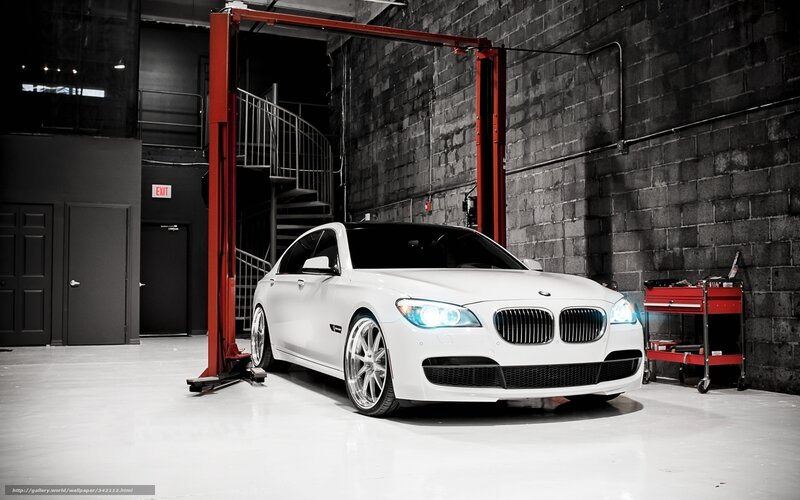 White BMW in garage