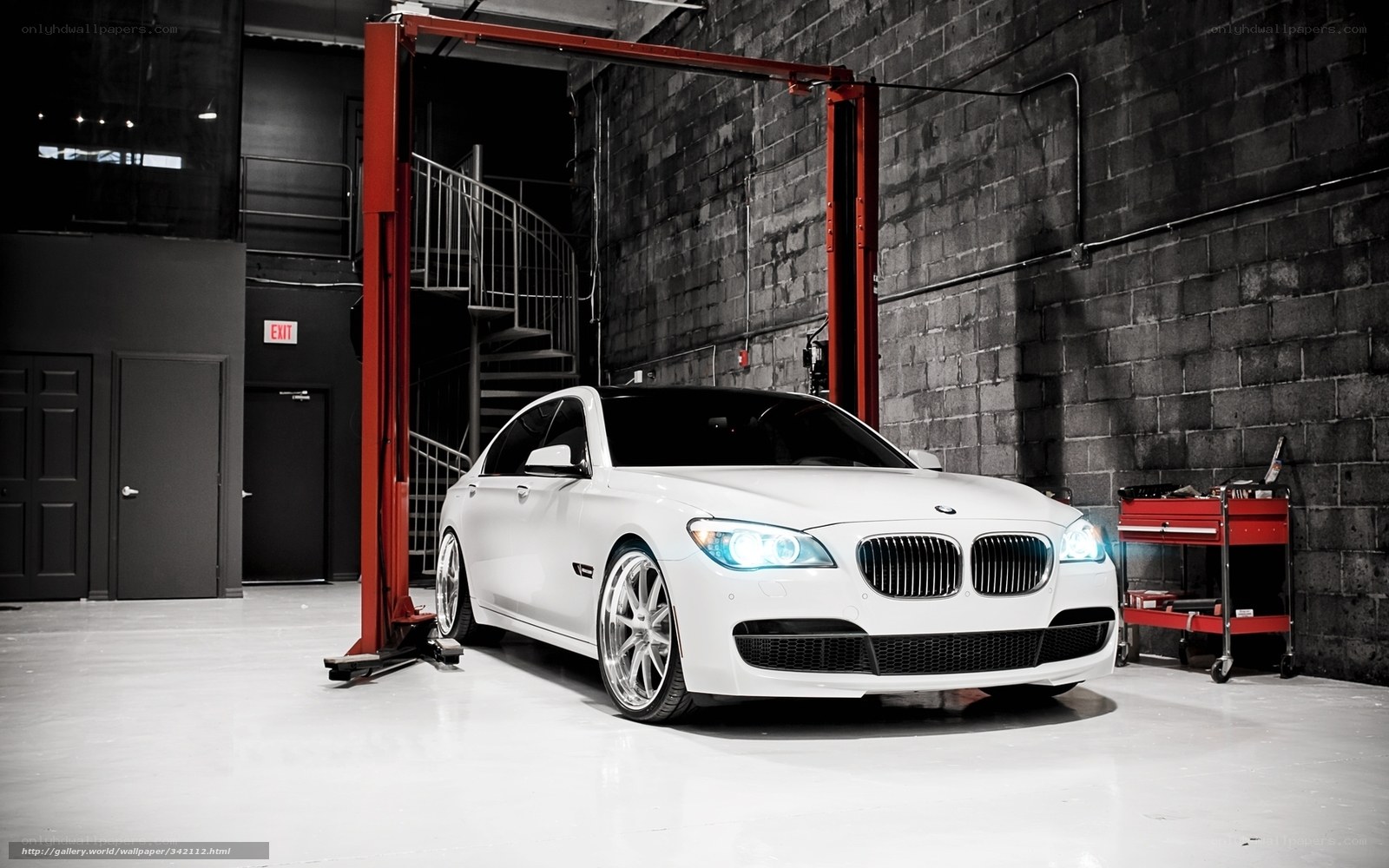 White BMW in garage