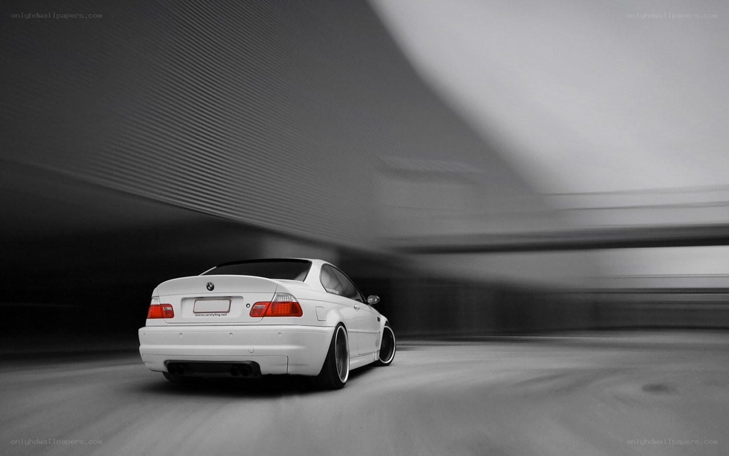 White BMW in motion