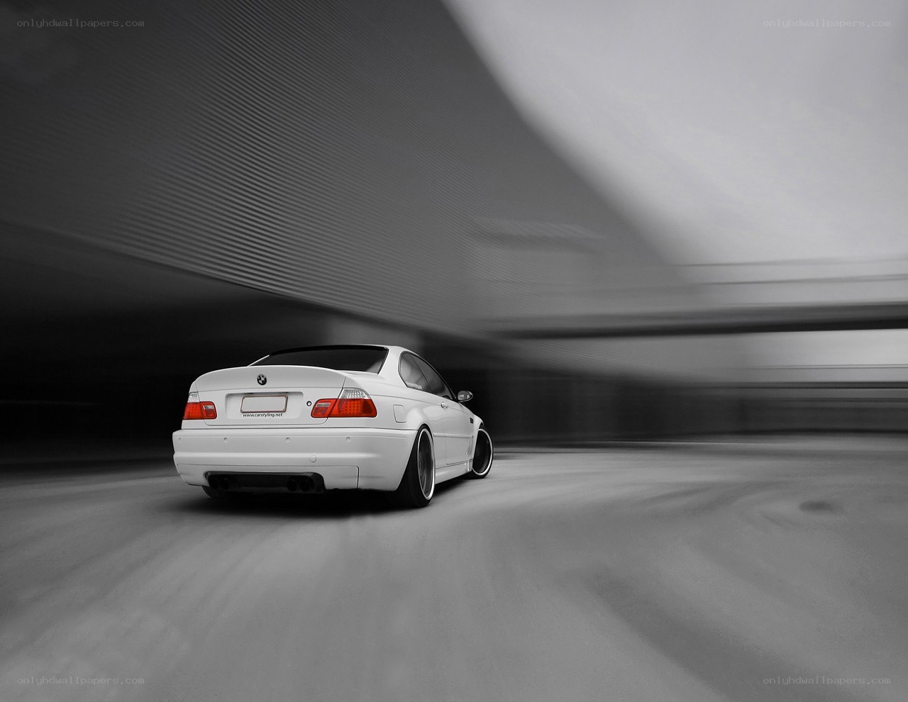 White BMW in motion