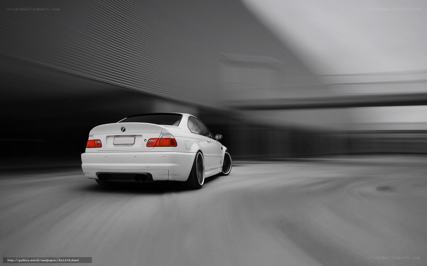 White BMW in motion