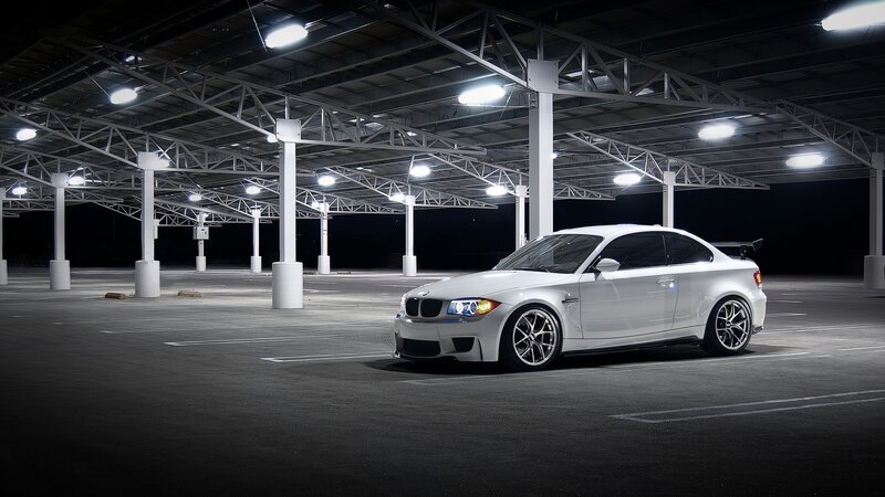 White BMW in parking garage