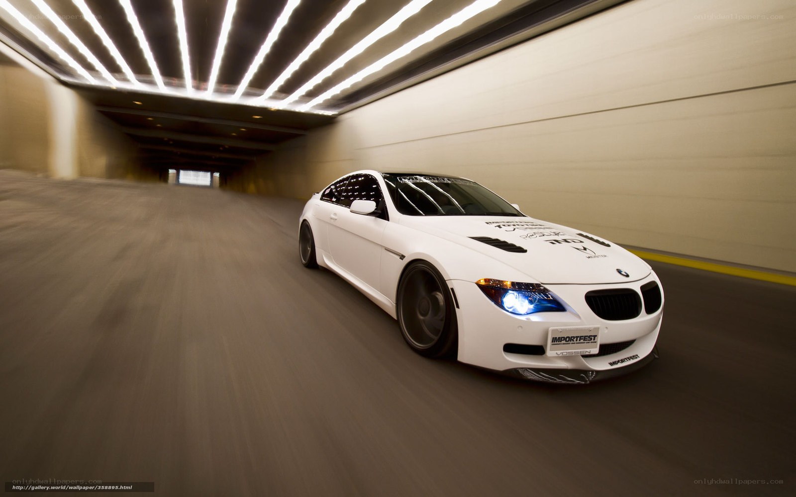 white bmw in tunnel