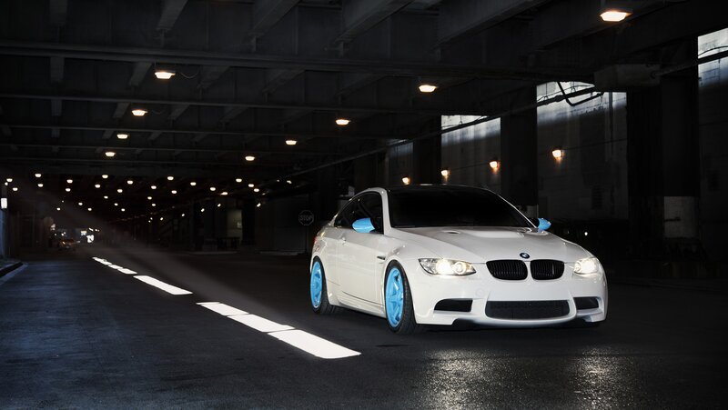 white bmw in underground tunnel