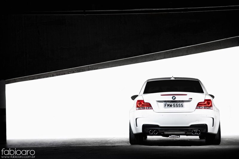 White BMW M135i under bridge