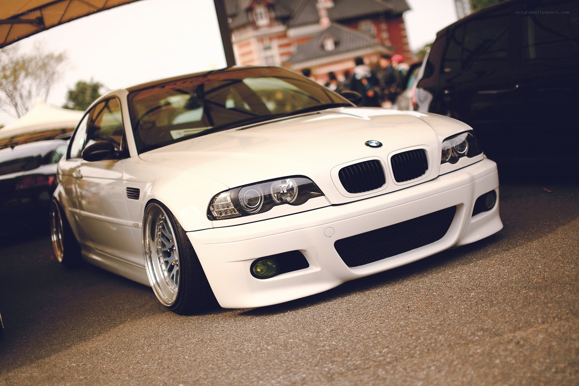 white bmw m3 at car show
