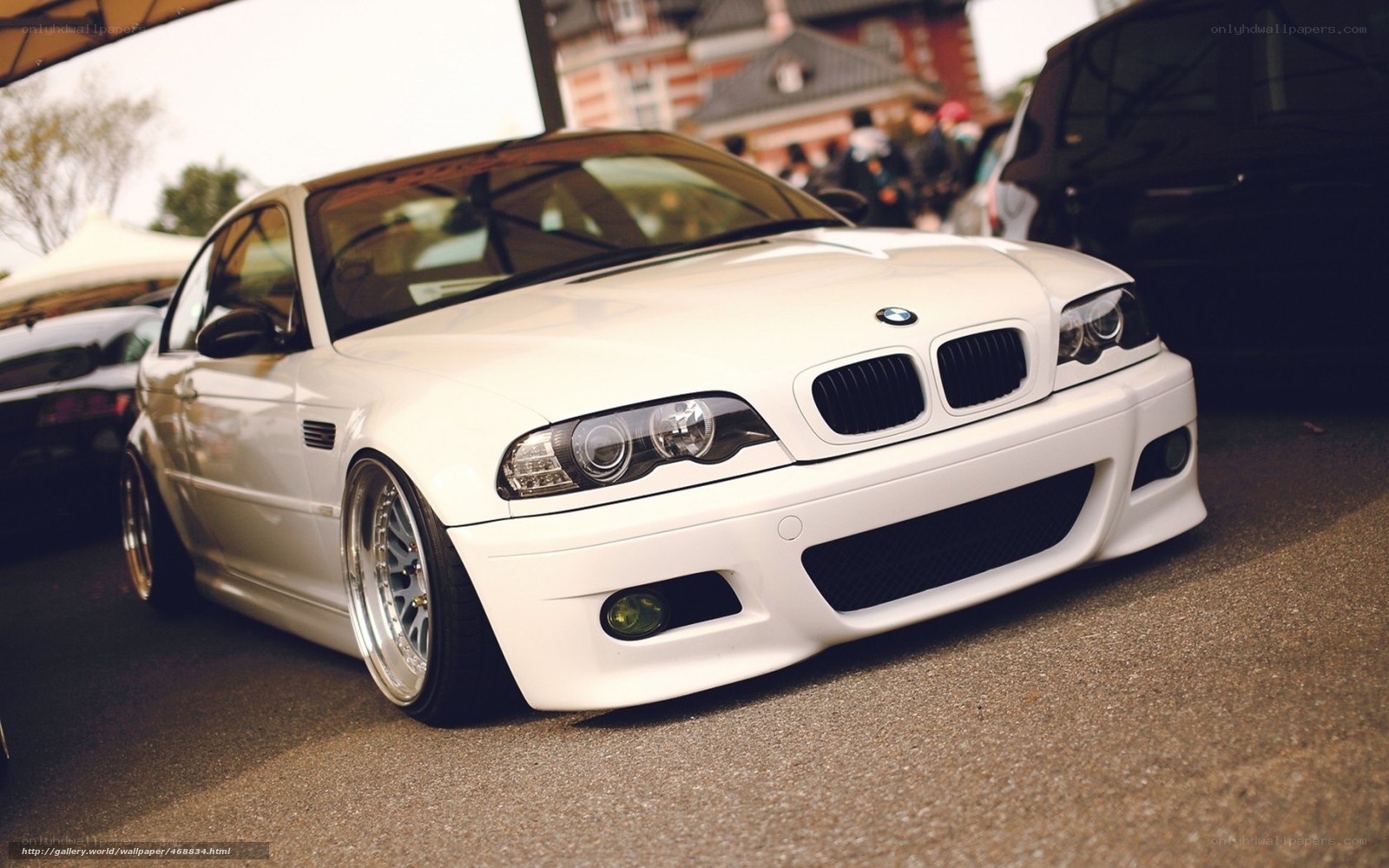 white bmw m3 at car show