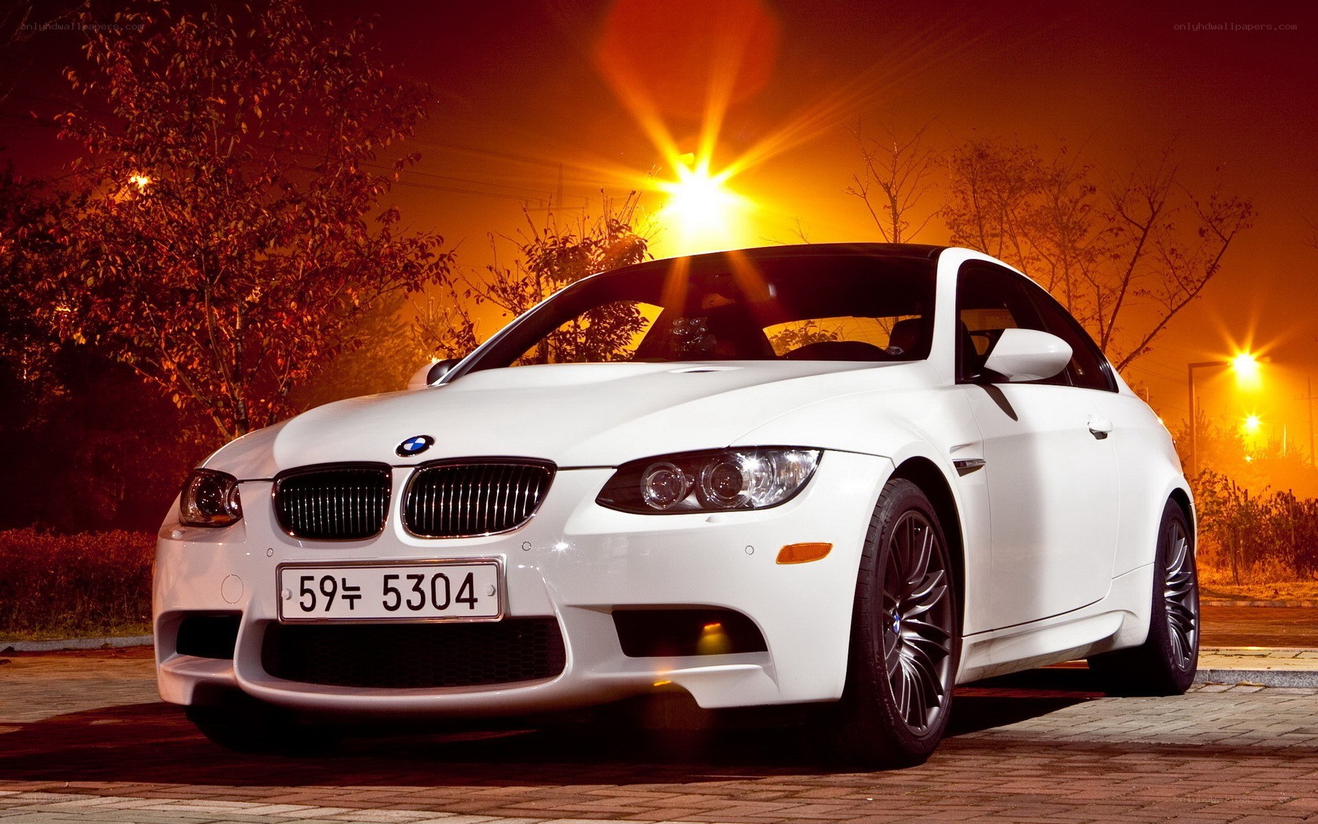 white bmw m3 at night