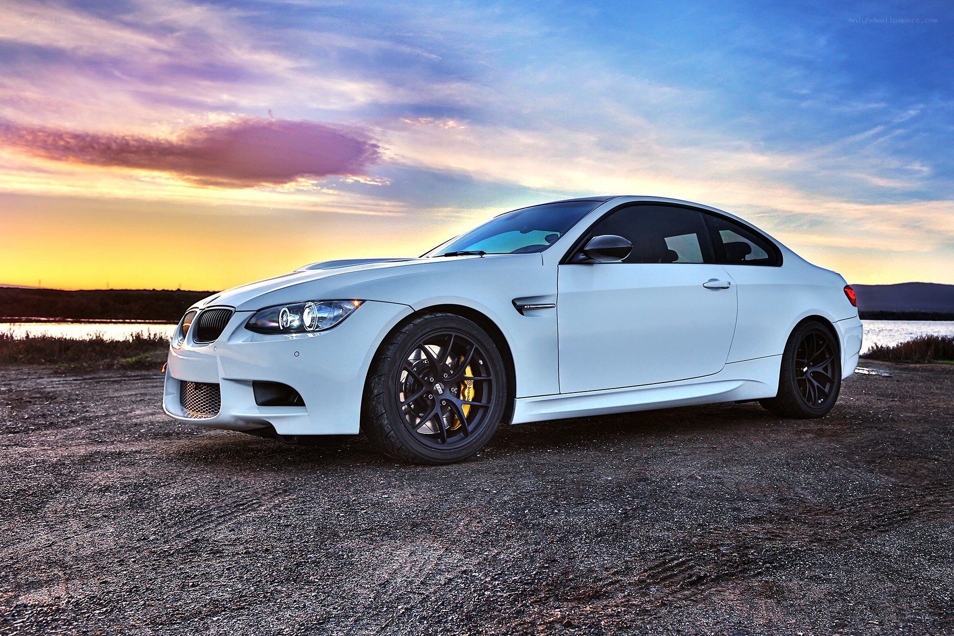White BMW M3 at sunset