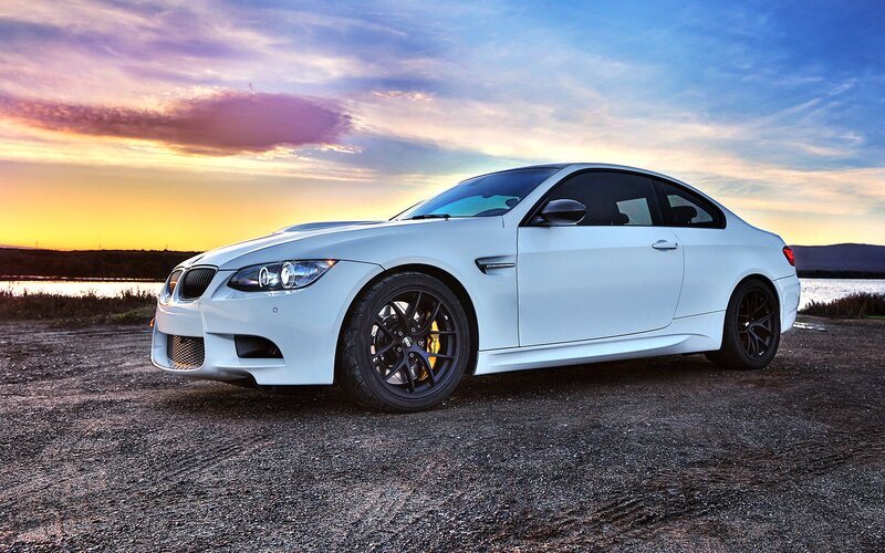 white bmw m3 at sunset