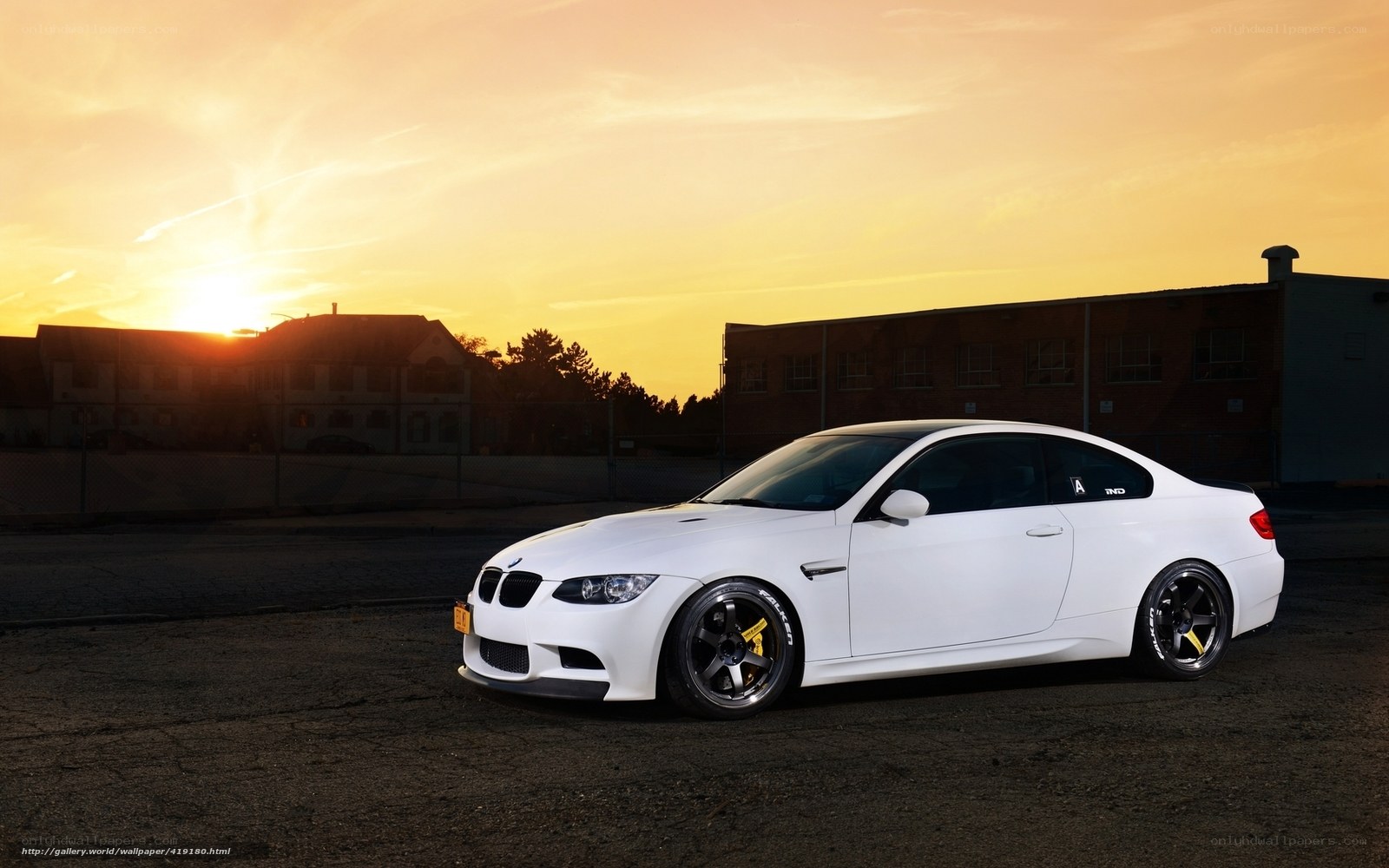 white bmw m3 at sunset