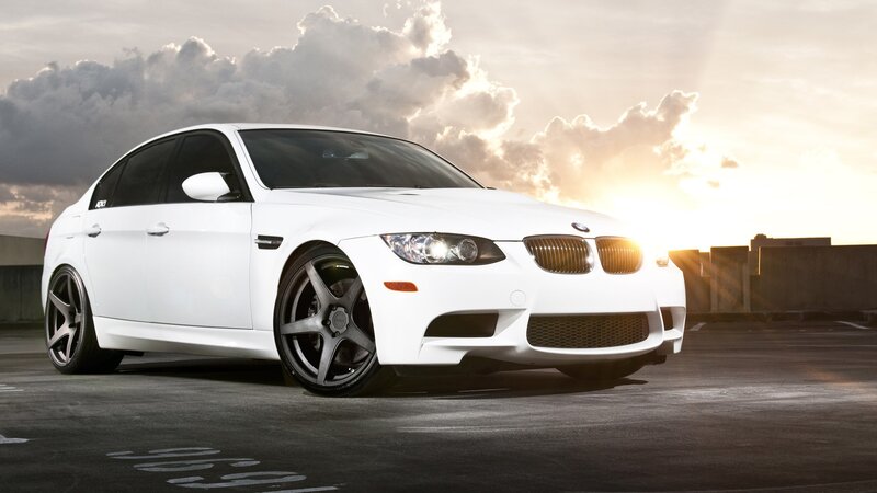white bmw m3 at sunset