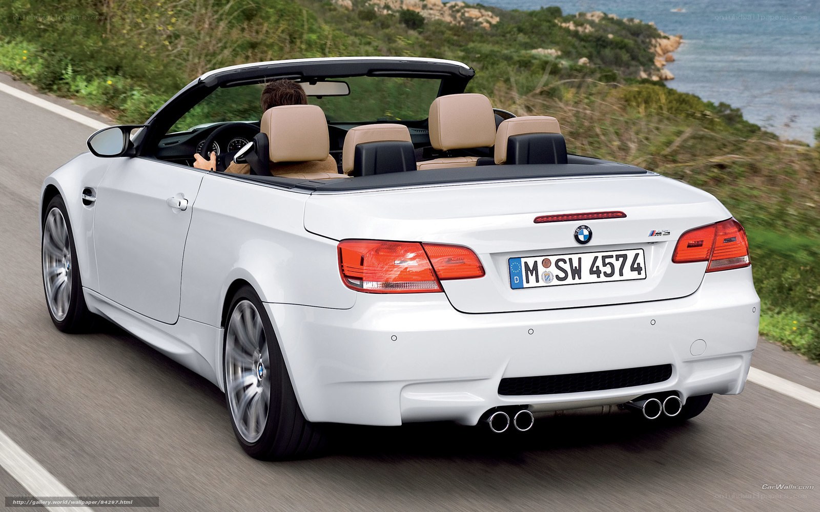 White BMW M3 convertible driving