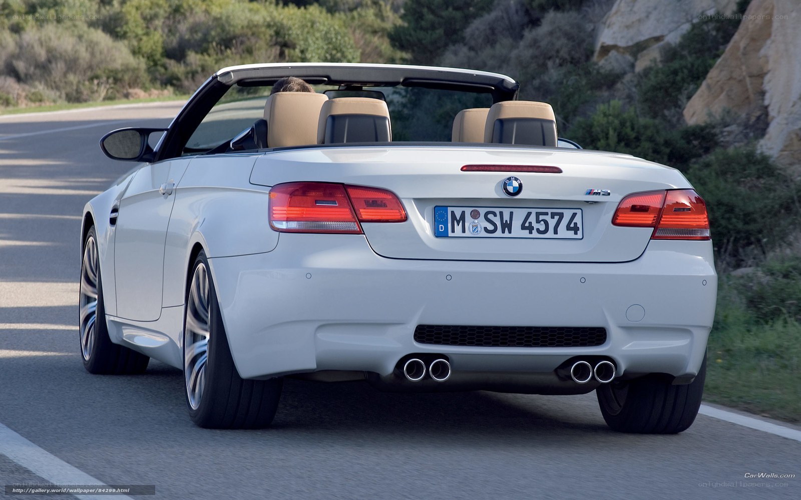 White BMW M3 convertible on road