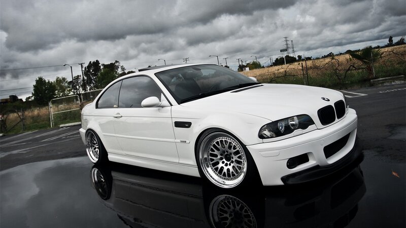 White BMW M3 Coupe — Dramatic, Photograph, Car, Wet Pavement, Cloudy Sky, Trees