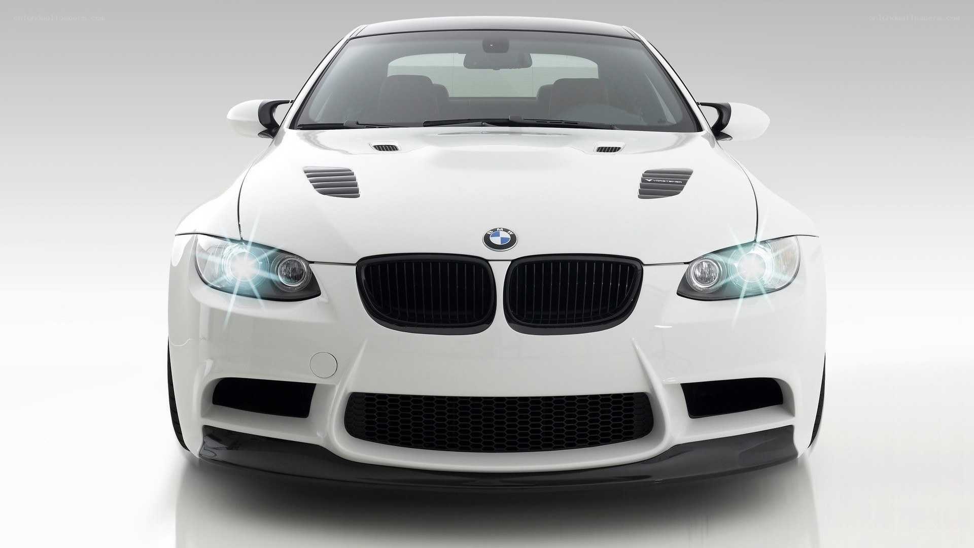 white bmw m3 front view