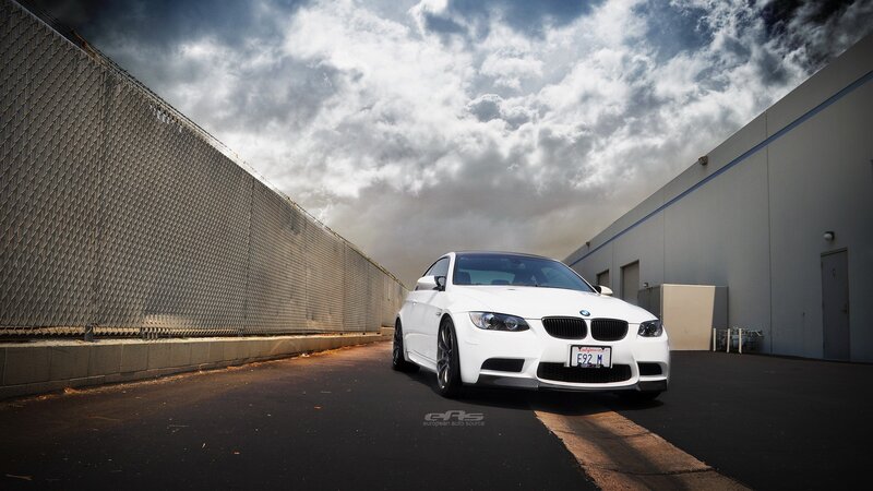 White BMW M3 in an alley
