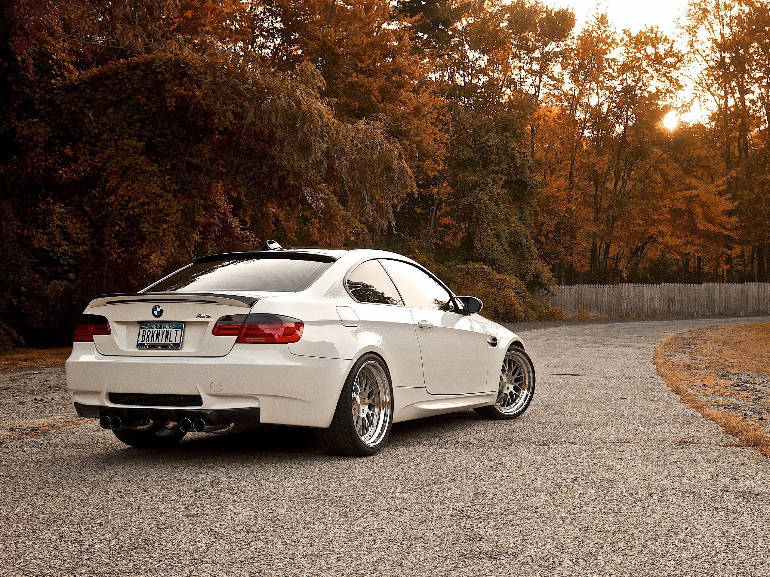 White BMW M3 in autumn