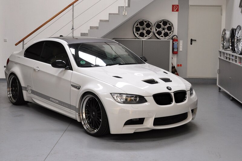 White BMW M3 in garage