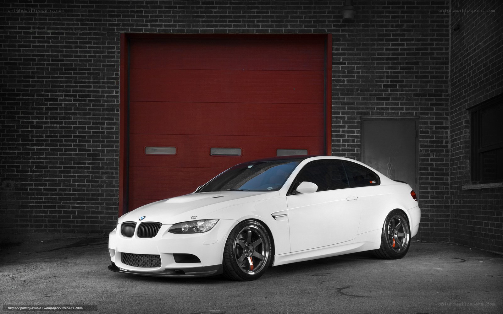 White BMW M3 in garage