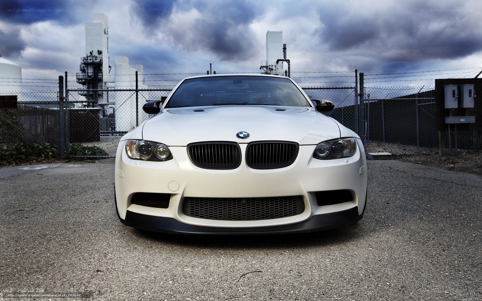white bmw m3 in industrial area