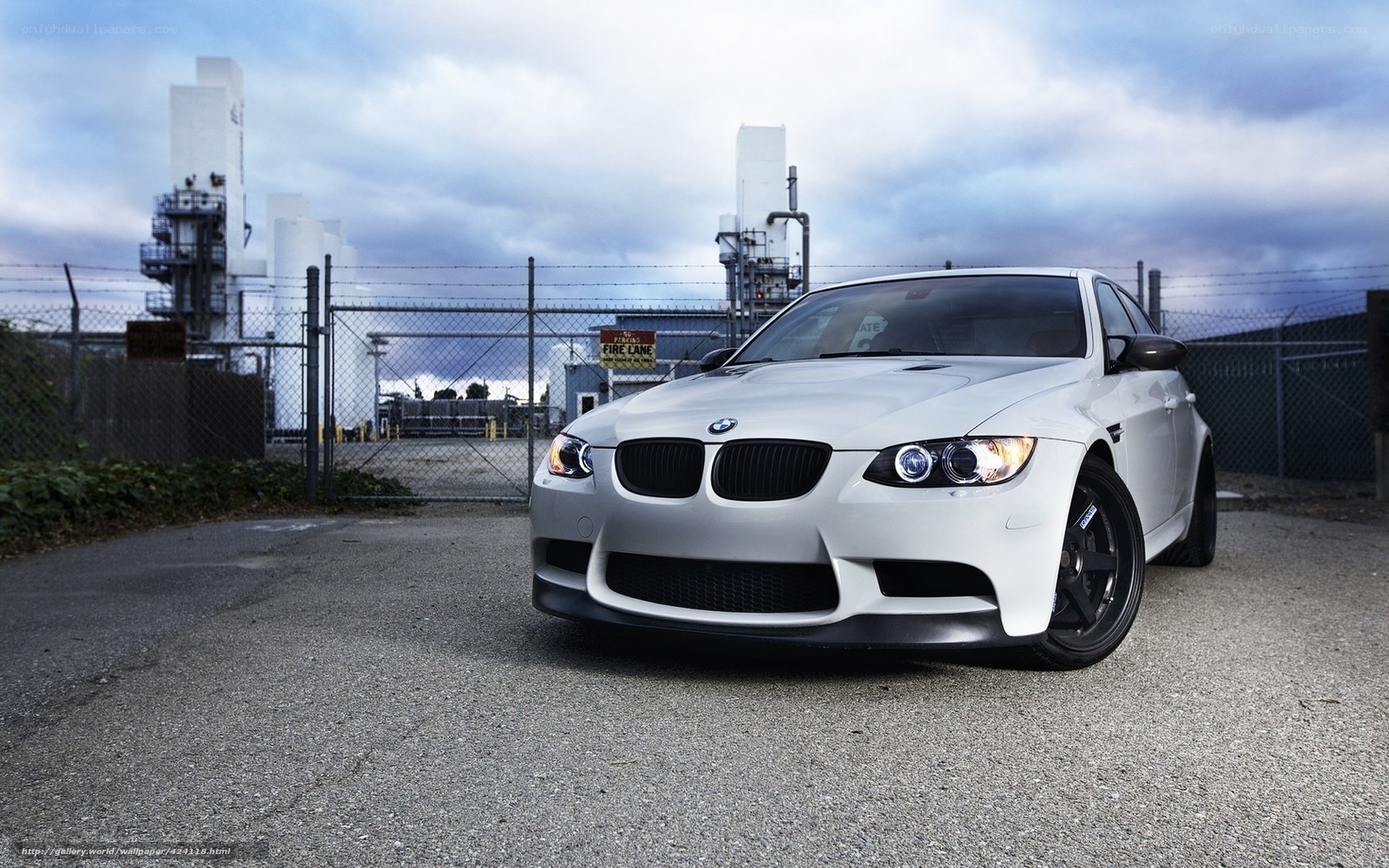 white bmw m3 in industrial area
